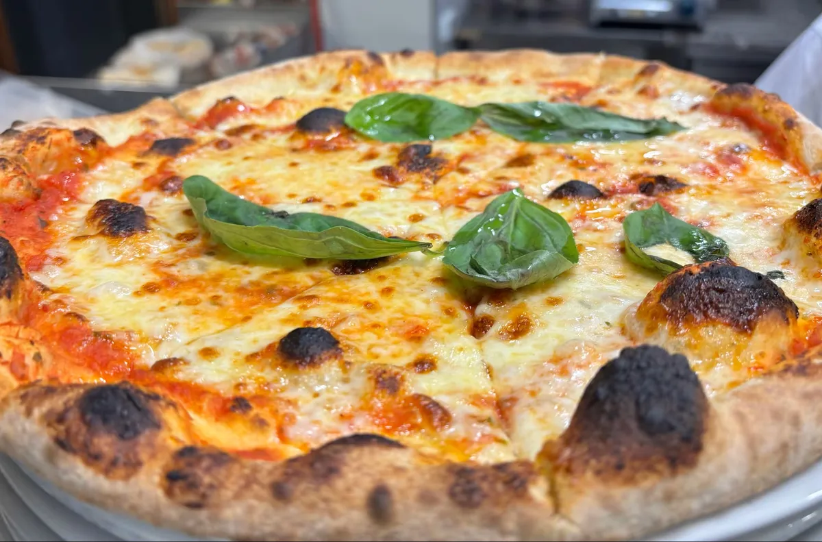 Как легендарната скиорка се сдоби със собствена пица в Кортина