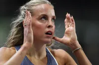 Олимпийска шампионка бяга с екип назаем на Световното