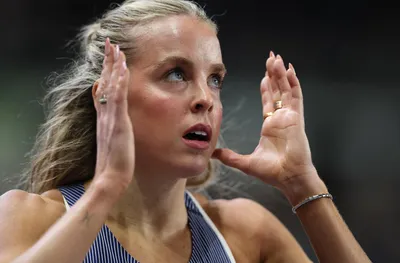 Олимпийска шампионка бяга с екип назаем на Световното